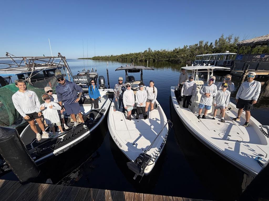Valerie’s House children and teens with Captain James Marko on a fishing boat before their ESPN feature.