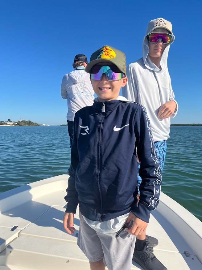 Valerie’s House children and teens with Captain James Marko on a fishing boat before their ESPN feature.