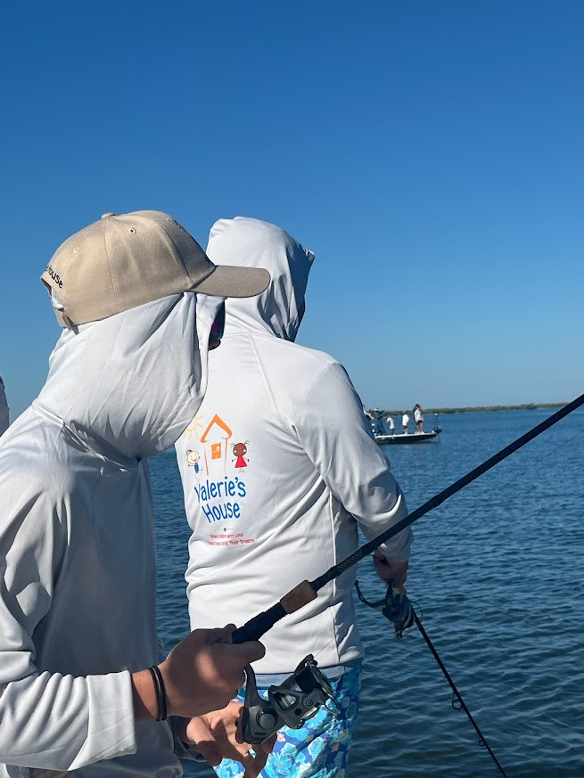 Valerie’s House children and teens with Captain James Marko on a fishing boat before their ESPN feature.