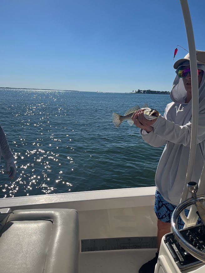 Valerie’s House children and teens with Captain James Marko on a fishing boat before their ESPN feature.