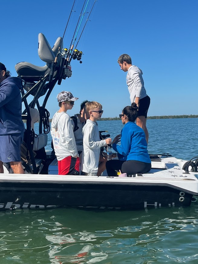 Valerie’s House children and teens with Captain James Marko on a fishing boat before their ESPN feature.